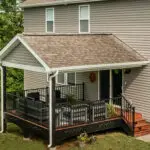 A house with a patio and a deck.