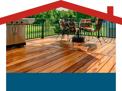 A wooden deck with a grill and table designed by a home improvement contractor.